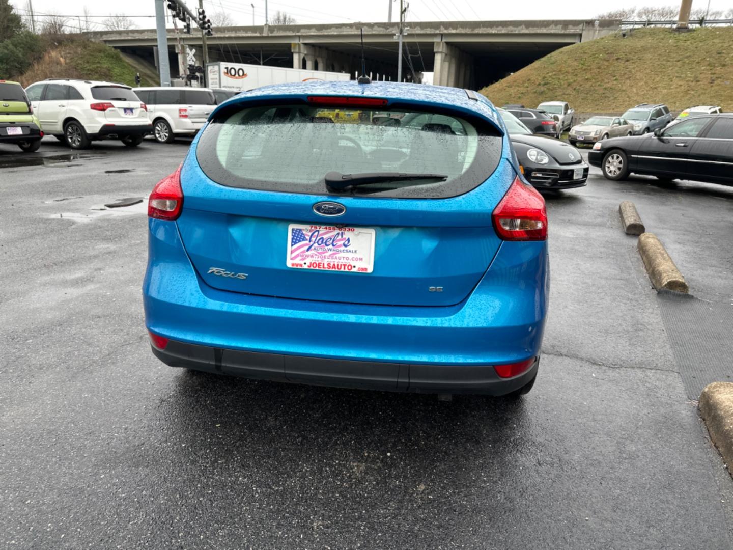 2017 Blue Ford Focus (1FADP3K27HL) , located at 5700 Curlew Drive, Norfolk, VA, 23502, (757) 455-6330, 36.841885, -76.209412 - Photo#4